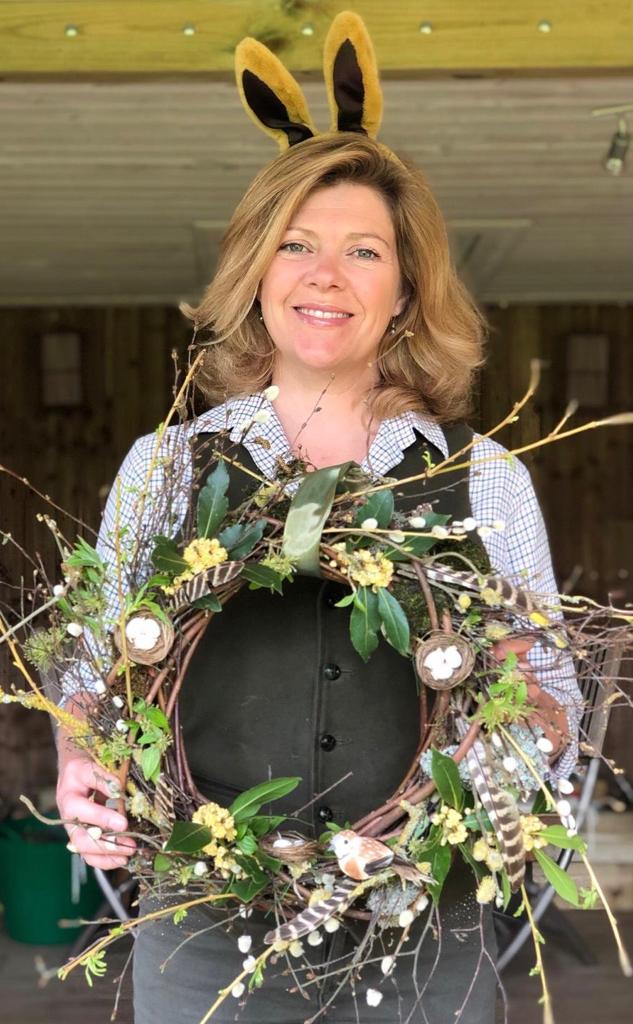 Katie holding an Easter wreath