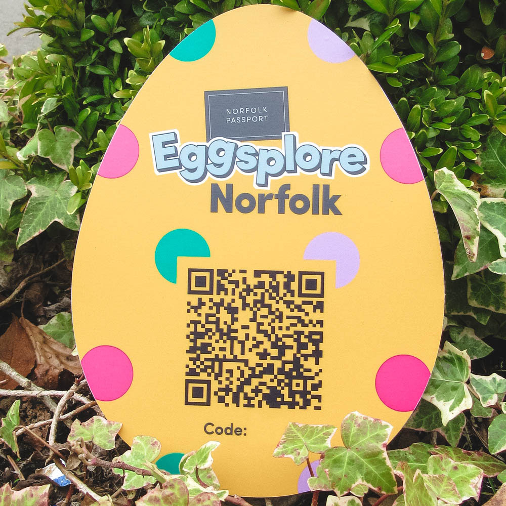 A picture of an Easter egg with a QR code advertising a scheme for and Easeter competition