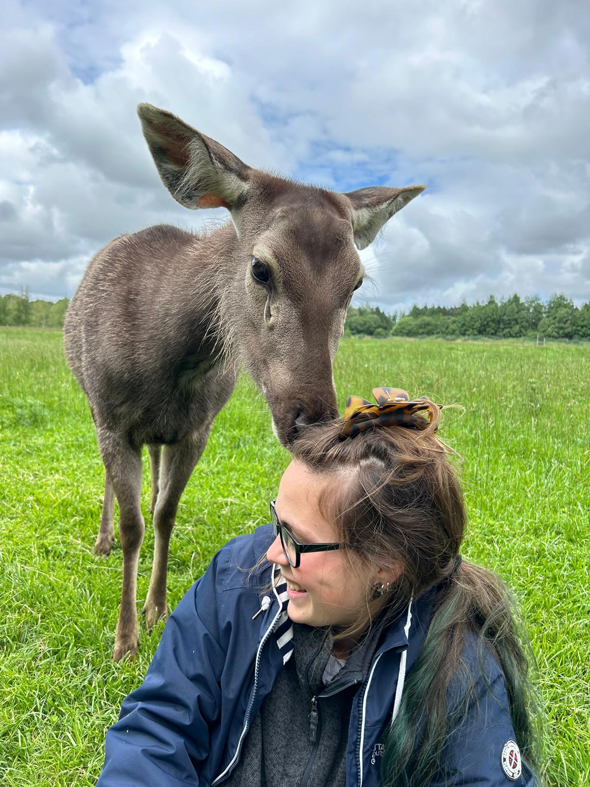 Miranda getting a cuddle from Orja mid survey